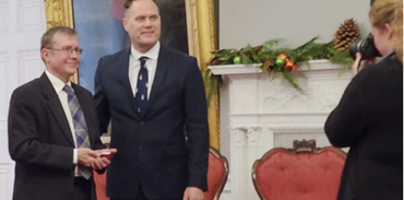 Dr. Ken Buchholz receiving the Queen's Jubilee Medal