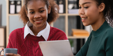 two Black women at a coffee shop