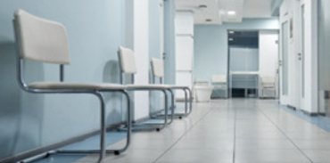 empty chairs in a hospital hallway