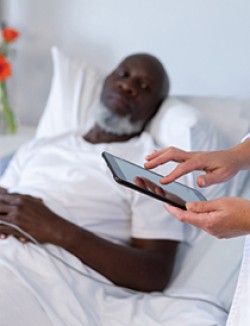 Man in hospital bed