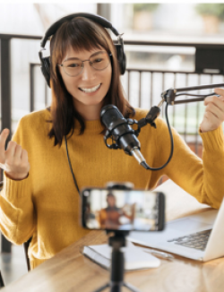 woman recording a podcast